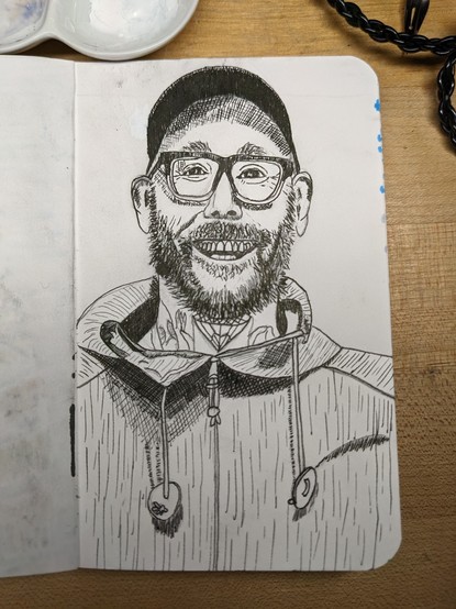A black and white pen and ink sketch of the Vincent Bennett, the lead singer of The Acacia Strain