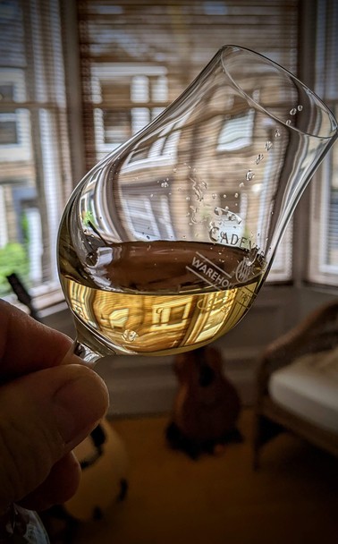 A copita glass with a golden honey coloured dram