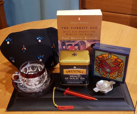 A tea tableau with an historic theme. The tea is Prince of Wales black tea blend by Twinings