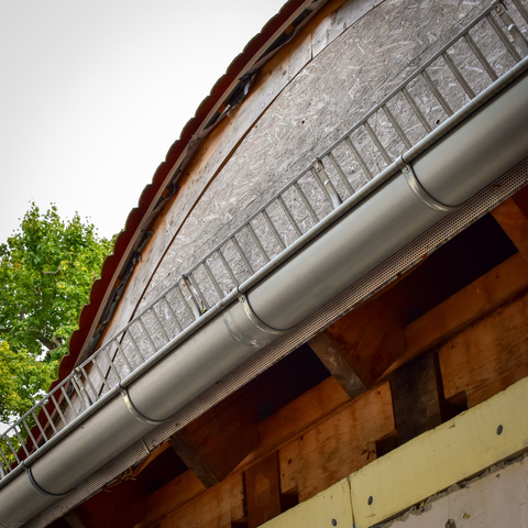 Boarded over dormer window, a former dormer if you will