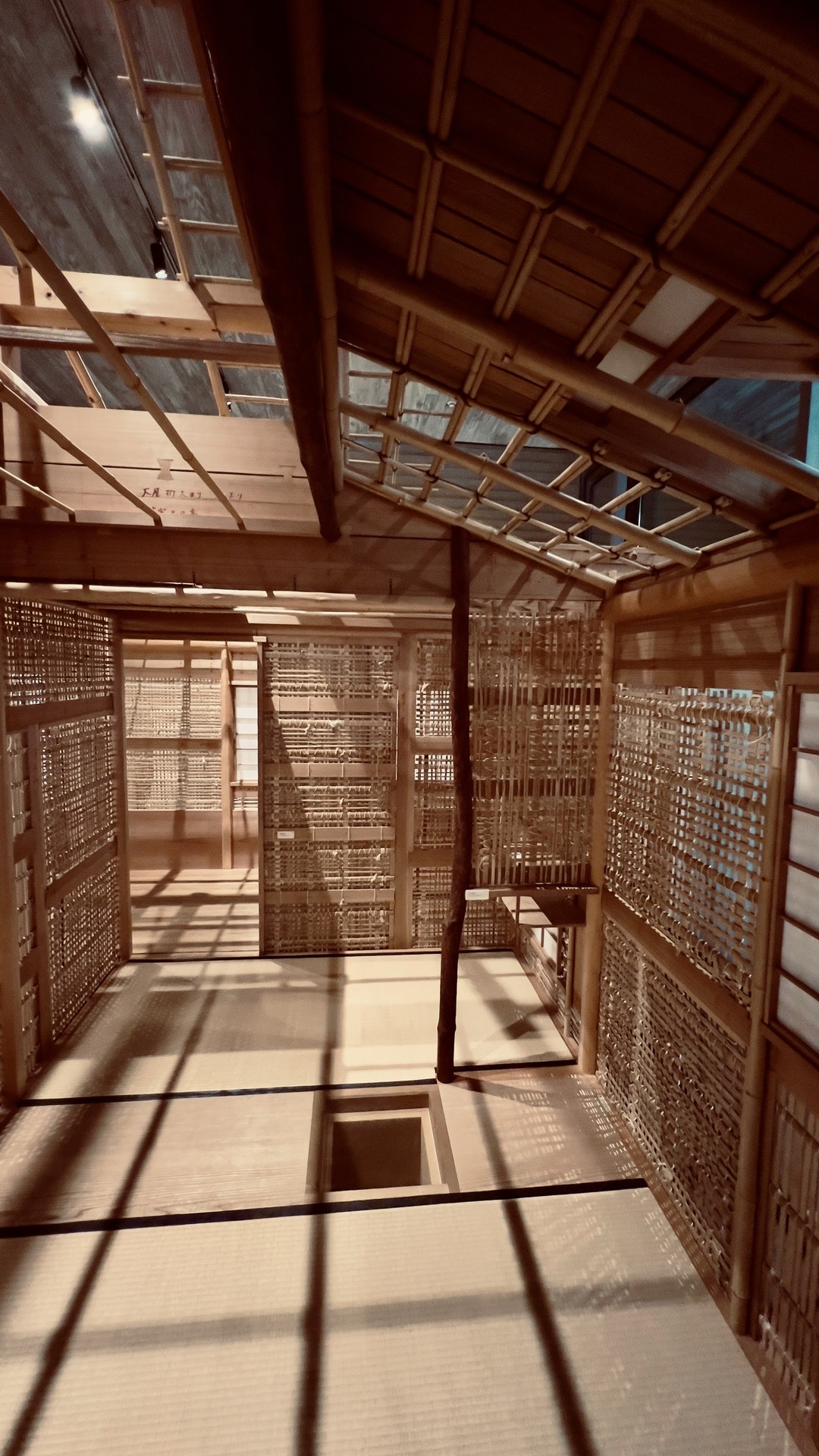 Interior of a tea house with architectural structure apparent. All bamboo assemblages are visible. 